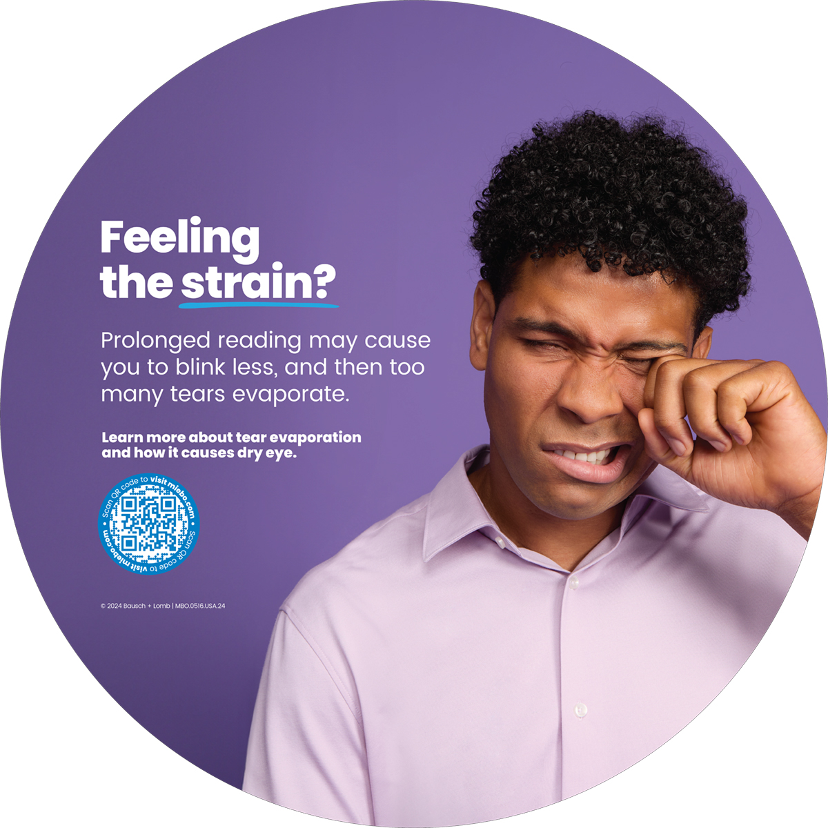 A man holding his nose while looking at the camera.
